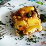 Запеченная говядина с луком и сыром